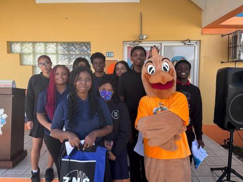 Peter the Pelican with students 1