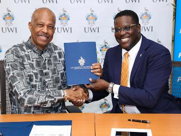 Vice-Chancellor Professor Sir Hilary Beckles and Vice-President and General Manager, Stephen Price 