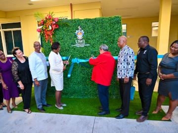 2. Cutting of the Ribbon being performed by Dame Susan Dougan, Governor-General of St Vincent and the Grenadines and Dr. The Honourable Ralph E. Gonsalves, Prime Minister of St. Vincent & the Grenadines...